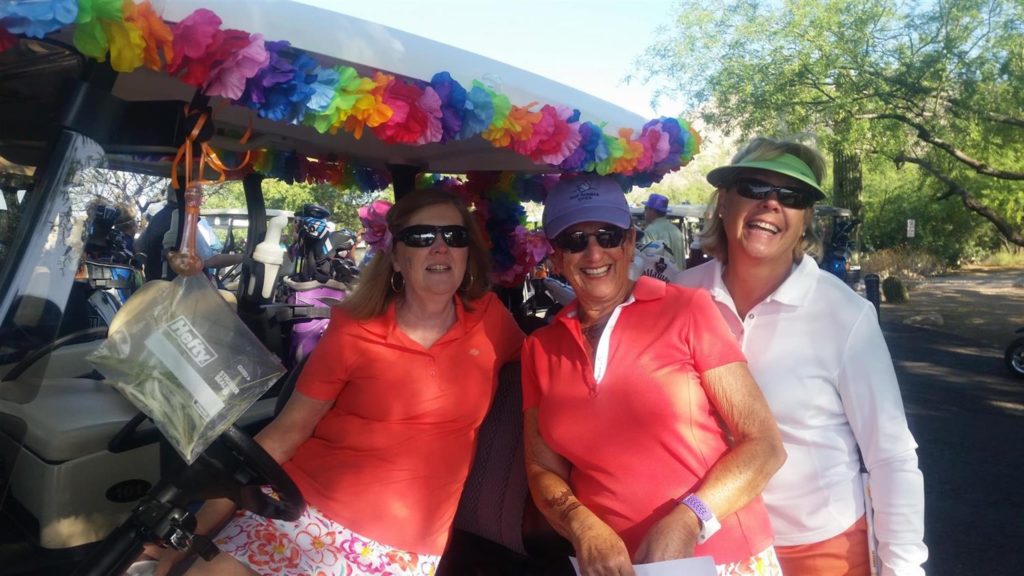 Ladies at the golf cart